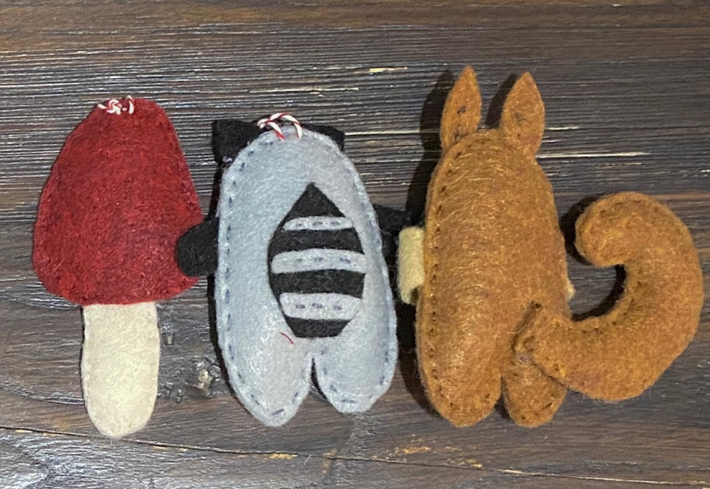 Hand-stitched felt creatures