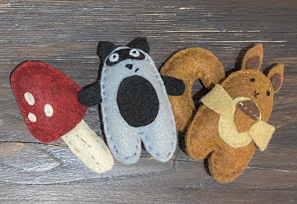 Hand-stitched felt creatures